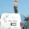 Hottie Dances on Roof of Moving Van 