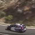 Rally car racer nearly driving off a cliff