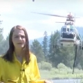 Reporting With A Helicopter Behind