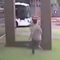Kid Smashes Through Glass Wall Trying To Catch The Bus