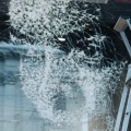 Artist creates portraits by smashing glass with a hammer