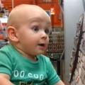 This baby loves shopping for paint