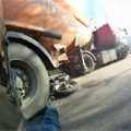 Biker Tries To Stop For Truck
