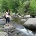 Girl Fails At Jumping Creek