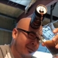 Drinker Pours Beer With His Forehead