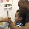 Baby laughing while getting shots