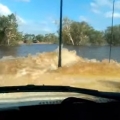 Driving A Landcruiser Through A Deep Pond