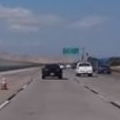 Camaro loses control on highway, miraculously recovers