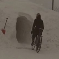 Riding Bikes Through Giant Snow Tunnel