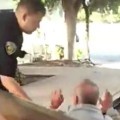 Police Officer Slaps Man After Pushing Him Down