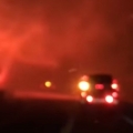 Fire Tornado Rips Across Road 
