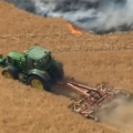 Heroic farmer ploughs to stop wildfire