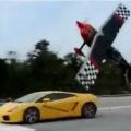 Stunt Plane Races Lamborghini 